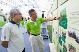 APRIL Group Chairman Bey Soo Khiang (right) shares APRIL's robust conservation and eco-restoration programmes with NParks' Assistant CEO Kong Yit San (left).