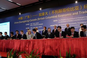 Woodfibre LNG Limited Country Manager and Vice President Corporate Affairs Byng Giraud (seated 4th from right) represented the company in the HoA signing.