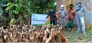 Asian Agri donated egg-laying ducks to the community
